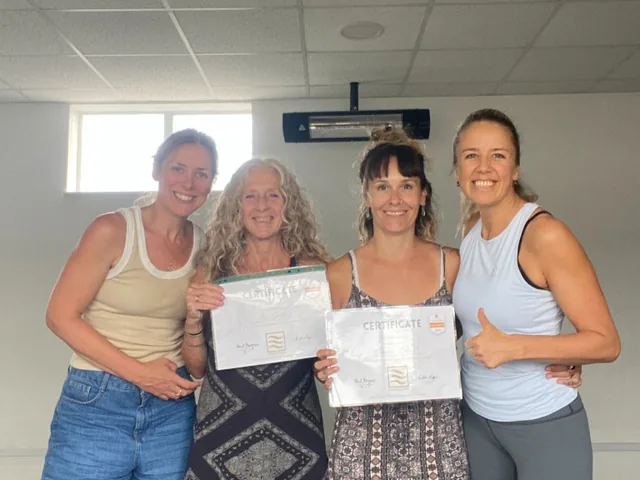 Raili Maripuu and Katia Major celebrating 200-hour Foundation Training graduates at Thames Wellness Academy